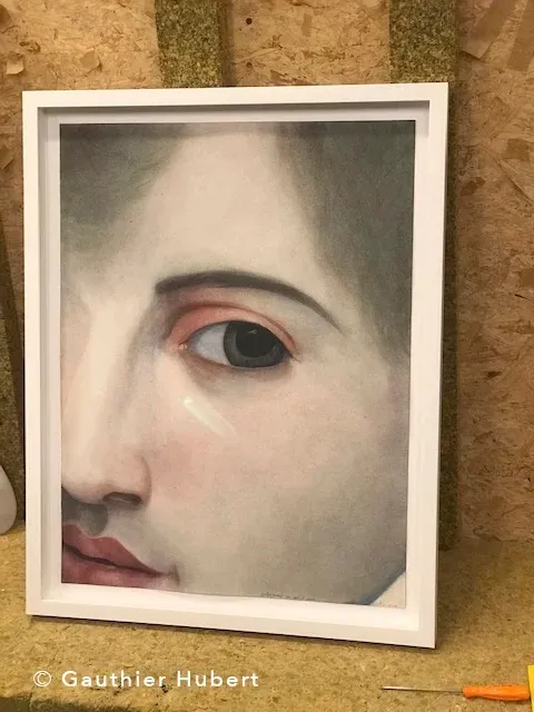 Œuvre d'art encadrée par l'atelier